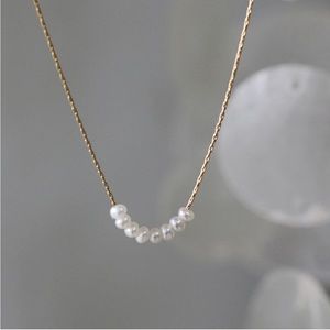 Women’s 18k gold freshwater pearl necklace